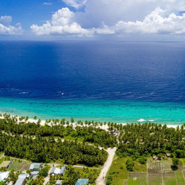 Caribbean Coastline Perspective. Aerial view of the pristine Caribbean coastline near the property, highlighting natural beauty, proximity, and lasting eco-value.